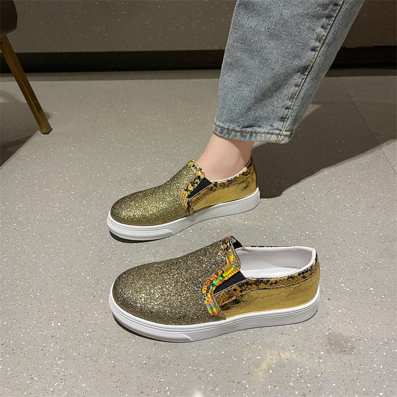 Scarpe da donna con punta tonda e paillettes, modello serpente e fondo piatto