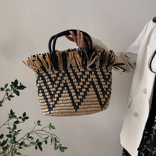 Borsa a secchiello intrecciata da donna per le vacanze al mare Tide