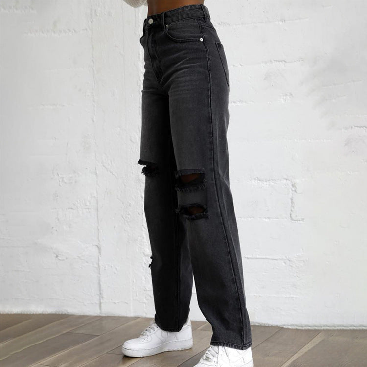 Pantaloni in denim da donna con buchi strappati