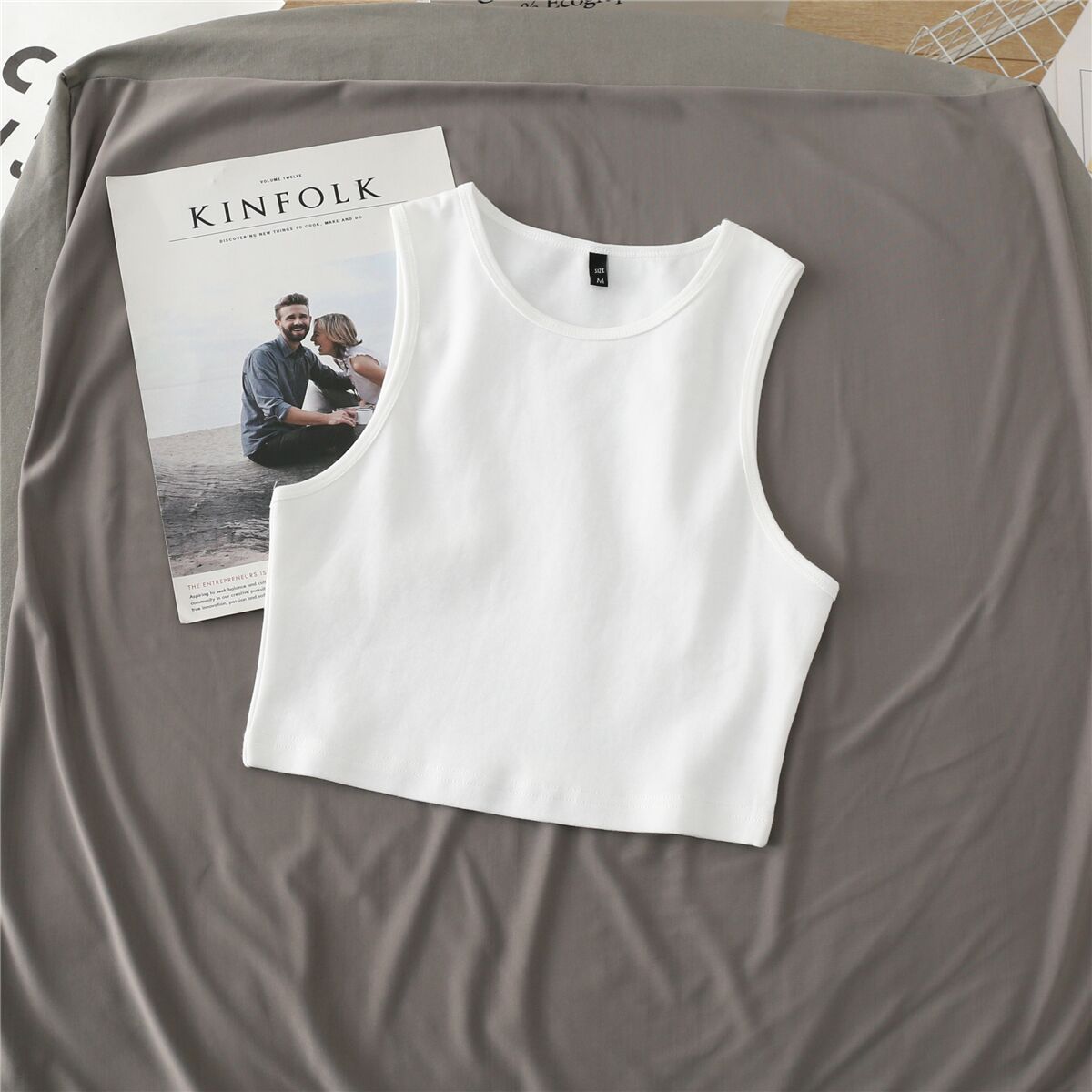 Canotta elasticizzata aderente corta senza maniche per l'ombelico da donna estiva