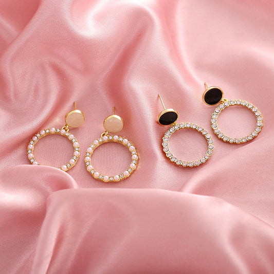 Orecchini a cerchio con diamanti