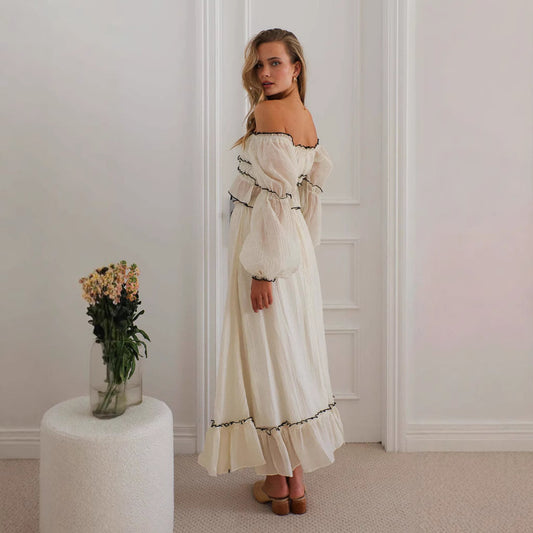 Tuta da vacanza con maniche a sbuffo e scollo a V