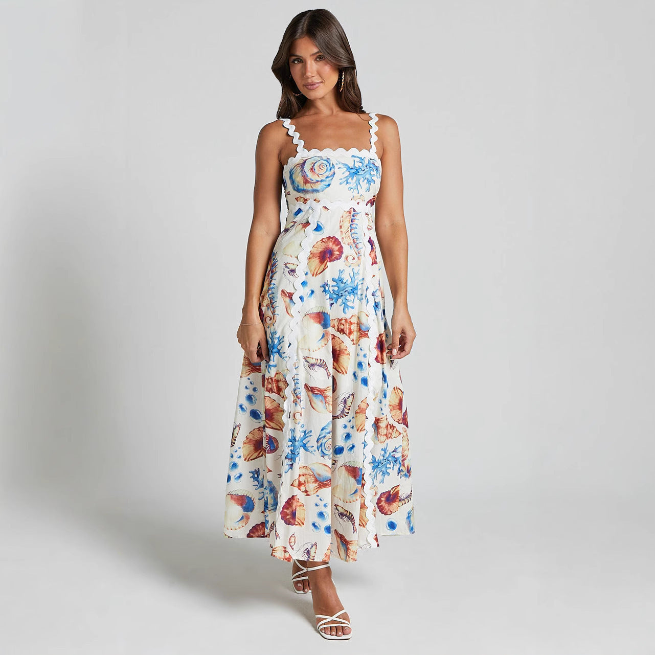 Abito stampato con cuciture a fionda