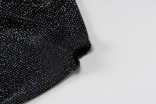 Pantaloni da donna a maniche lunghe con scollo alto e schiena scoperta