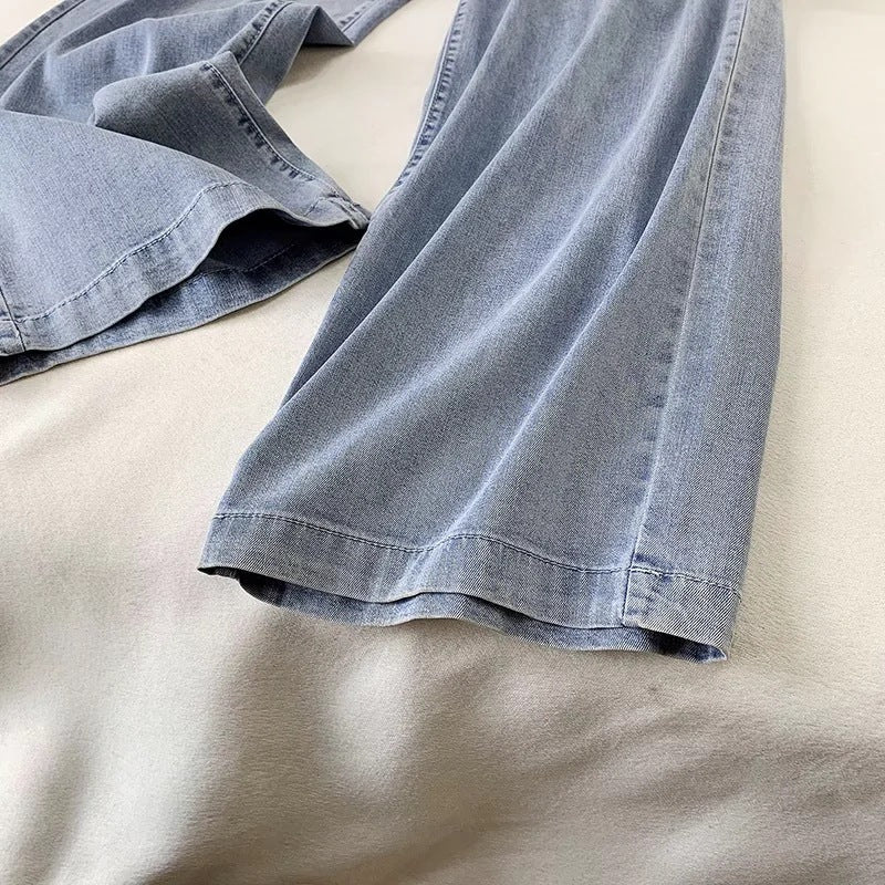 Pantaloni a gamba larga con coulisse in denim alla moda da donna
