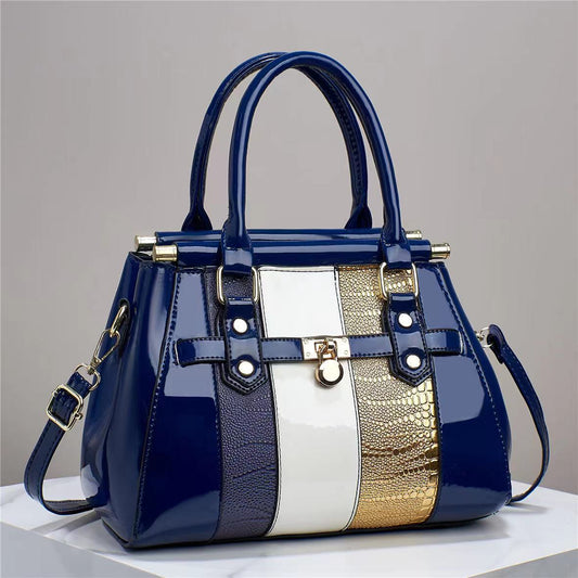 Borsa a tracolla grande capacità in pelle lucida con cuciture verticali e motivo lucertola