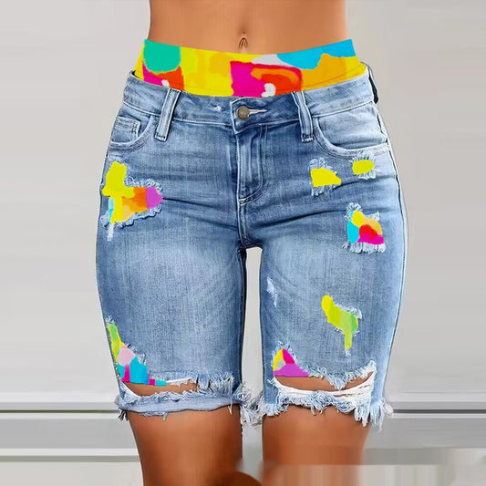 Shorts in denim finto strappato e con patchwork a contrasto di colore