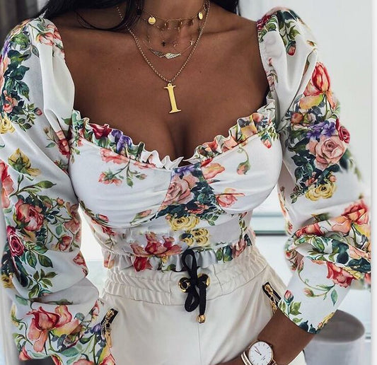 T-shirt a maniche lunghe con stampa di fiori di rosa disponibile in magazzino