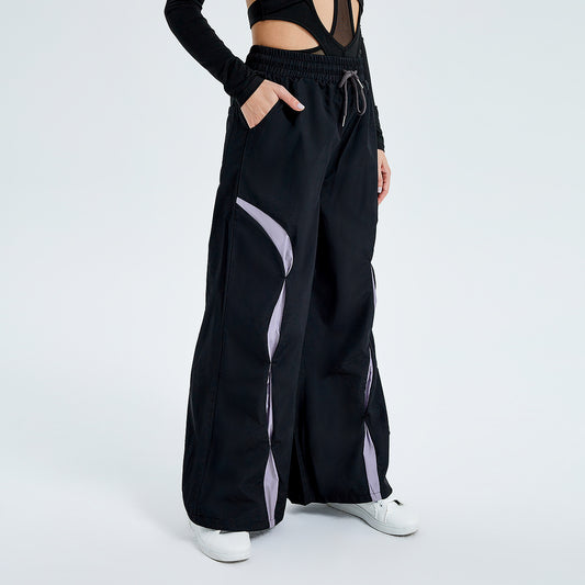 Pantaloni sportivi allacciati a vita alta con contrasto di colore e larghi pantaloni casual in tessuto