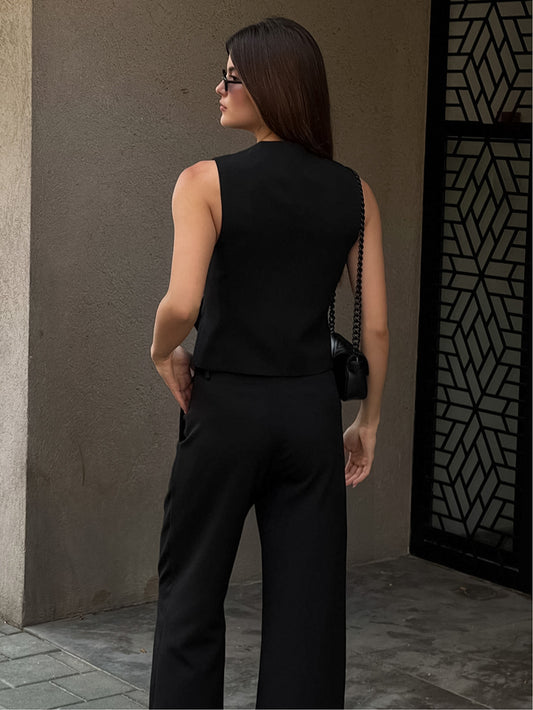 Completo da donna elegante alla moda in cotone e lino con pantaloni dritti a vita alta
