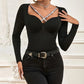 Maglietta a maniche lunghe slim fit con scollo a V e motivo incrociato da donna