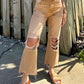 Jeans larghi e dritti strappati da donna