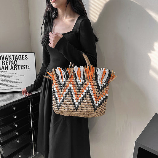 Borsa a secchiello intrecciata da donna per le vacanze al mare Tide