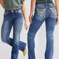 Pantaloni alla caviglia in denim con ricamo da donna alla moda