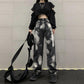 Jeans da donna a gamba larga, neri, aderenti, a vita alta e con effetto tie-dye