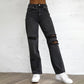 Pantaloni in denim da donna con buchi strappati