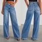 Jeans larghi da donna con cuciture laterali, orlo sfilacciato e gamba larga