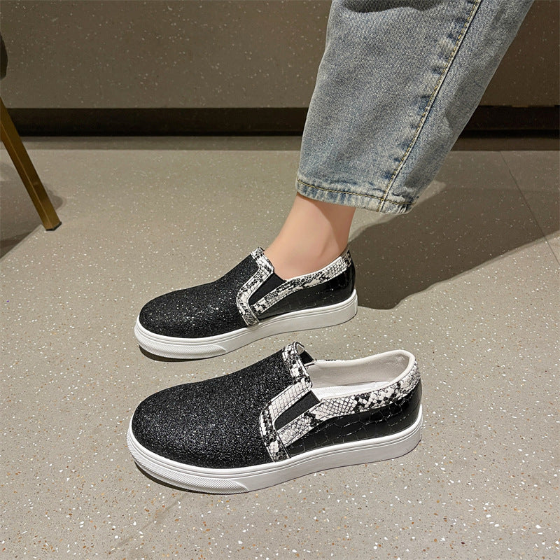 Scarpe da donna con punta tonda e paillettes, modello serpente e fondo piatto