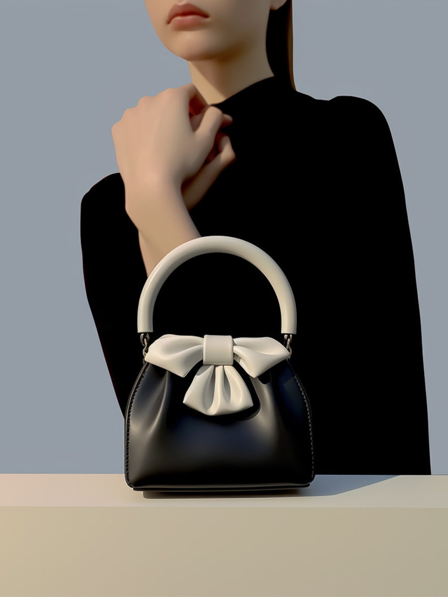 Borsa a secchiello con fiocco a contrasto di colore, da donna, plissettata