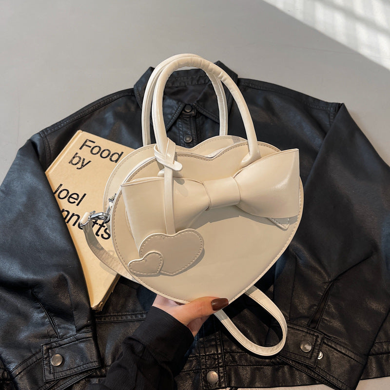 Borsa a tracolla portatile alla moda con fiocco a forma di cuore
