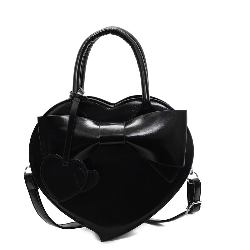 Borsa a tracolla portatile alla moda con fiocco a forma di cuore