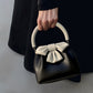 Borsa a secchiello con fiocco a contrasto di colore, da donna, plissettata