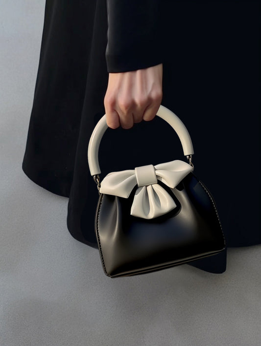 Borsa a secchiello con fiocco a contrasto di colore, da donna, plissettata
