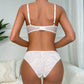 Completo intimo con reggiseno imbottito e ricamo traforato per donna