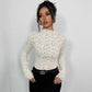 Maglietta aderente in pizzo con collo alto e orecchie in legno da donna