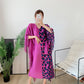 Abito da donna autunnale con stampa leopardata plissettata e colori coordinati