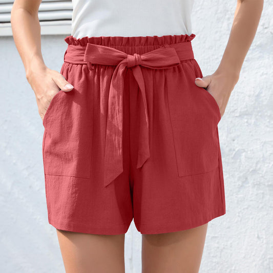 Pantaloncini da spiaggia estivi con tasche, con fiocco e volant alla moda, da donna