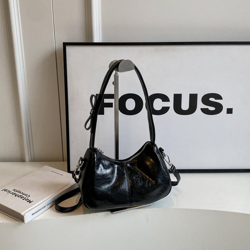 Borsa a tracolla obliqua rossa da portare a mano sotto le ascelle