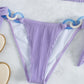 Solider Neckholder-Strandbikini mit seitlicher Krawatte und Schmuck