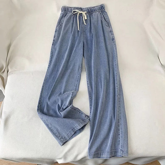 Pantaloni a gamba larga con coulisse in denim alla moda da donna