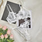 Completo intimo trasparente in pizzo con cinturino da donna