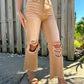 Jeans larghi e dritti strappati da donna
