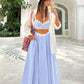 Set di reggiseno in pizzo con spalline e gonne a pieghe larghe a vita alta