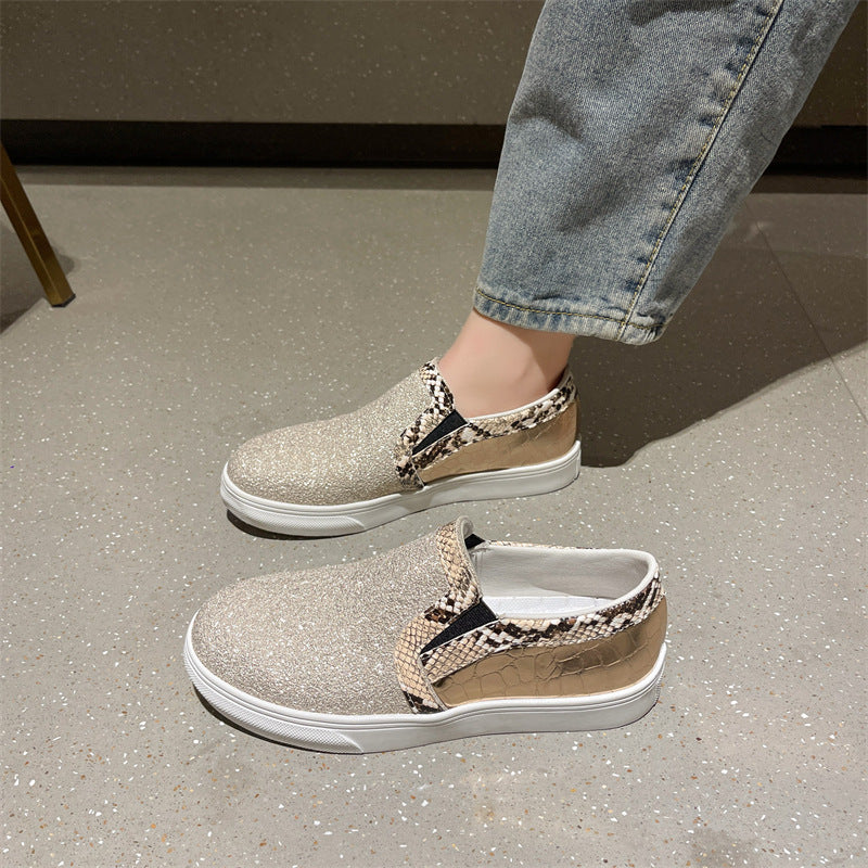 Scarpe da donna con punta tonda e paillettes, modello serpente e fondo piatto