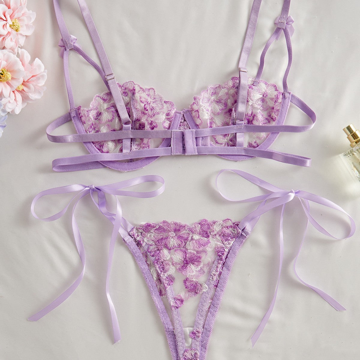 Lingerie sexy con fiocco di neve ricamato in pizzo trasparente
