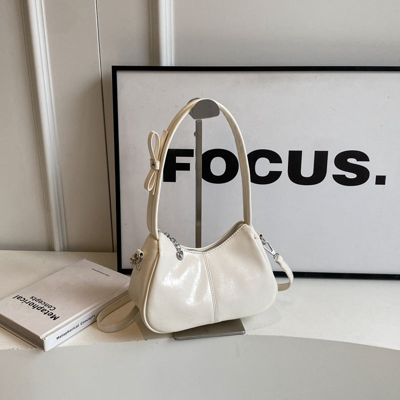 Borsa a tracolla obliqua rossa da portare a mano sotto le ascelle