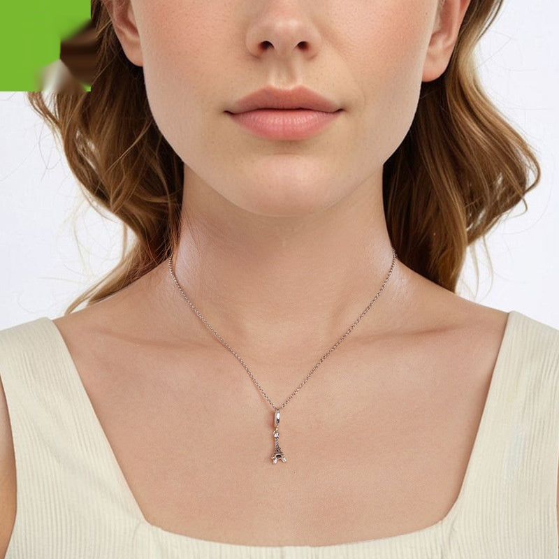 Ciondolo Torre Eiffel con apertura e chiusura in argento 925 con perline