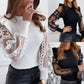 Blusa girocollo in rete traforata