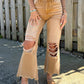 Jeans larghi e dritti strappati da donna