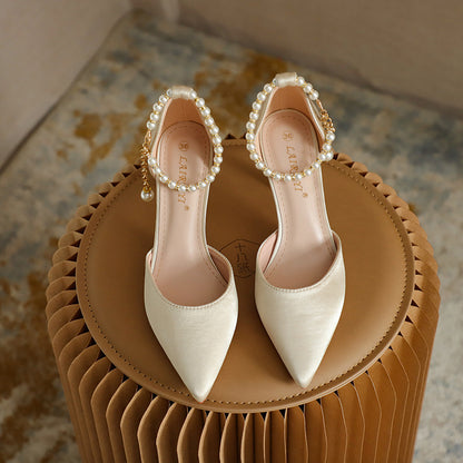 Scarpe con tacco a spillo a punta e scollate