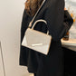 Borsa a mano alla moda con design speciale per autunno e inverno