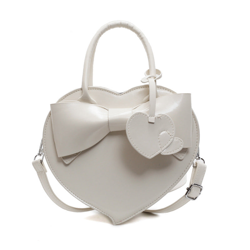 Borsa a tracolla portatile alla moda con fiocco a forma di cuore