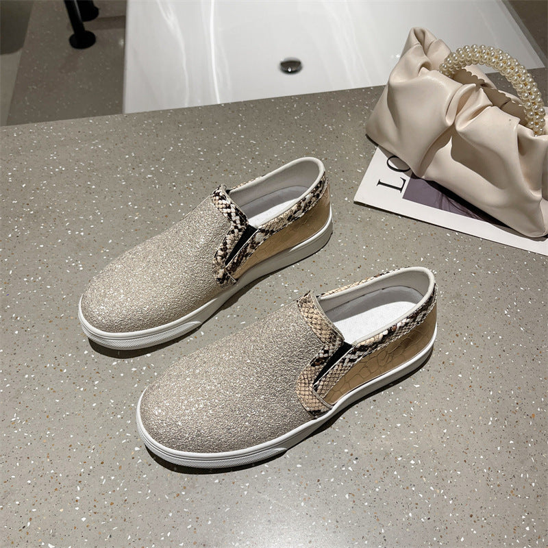 Scarpe da donna con punta tonda e paillettes, modello serpente e fondo piatto