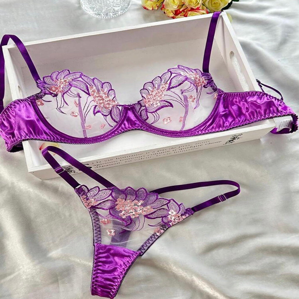 Completo intimo da donna con anello in acciaio e nastro ricamato viola