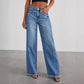 Jeans larghi da donna con cuciture laterali, orlo sfilacciato e gamba larga