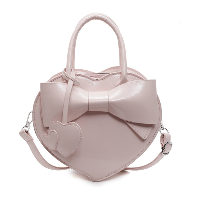 Borsa a tracolla portatile alla moda con fiocco a forma di cuore